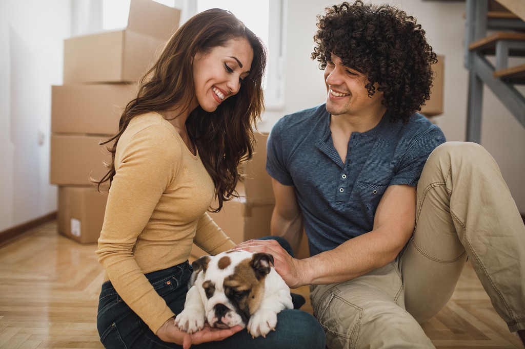 Verified customer with their dog at home